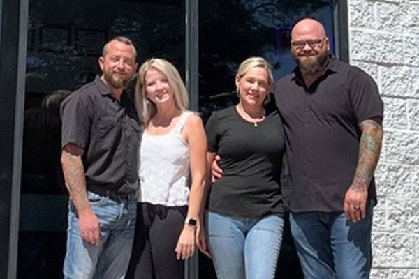 Smoky Hill Auto Service staff photo outside shop